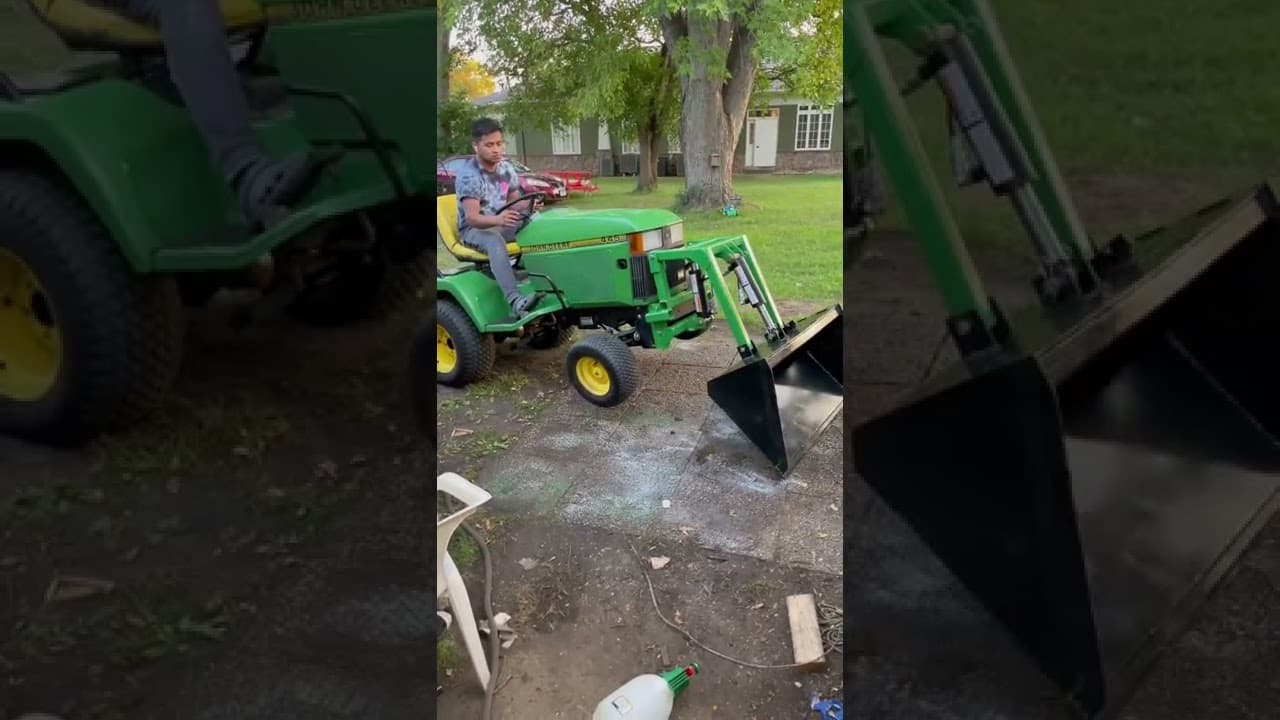 445 John Deere with homemade bucket loader