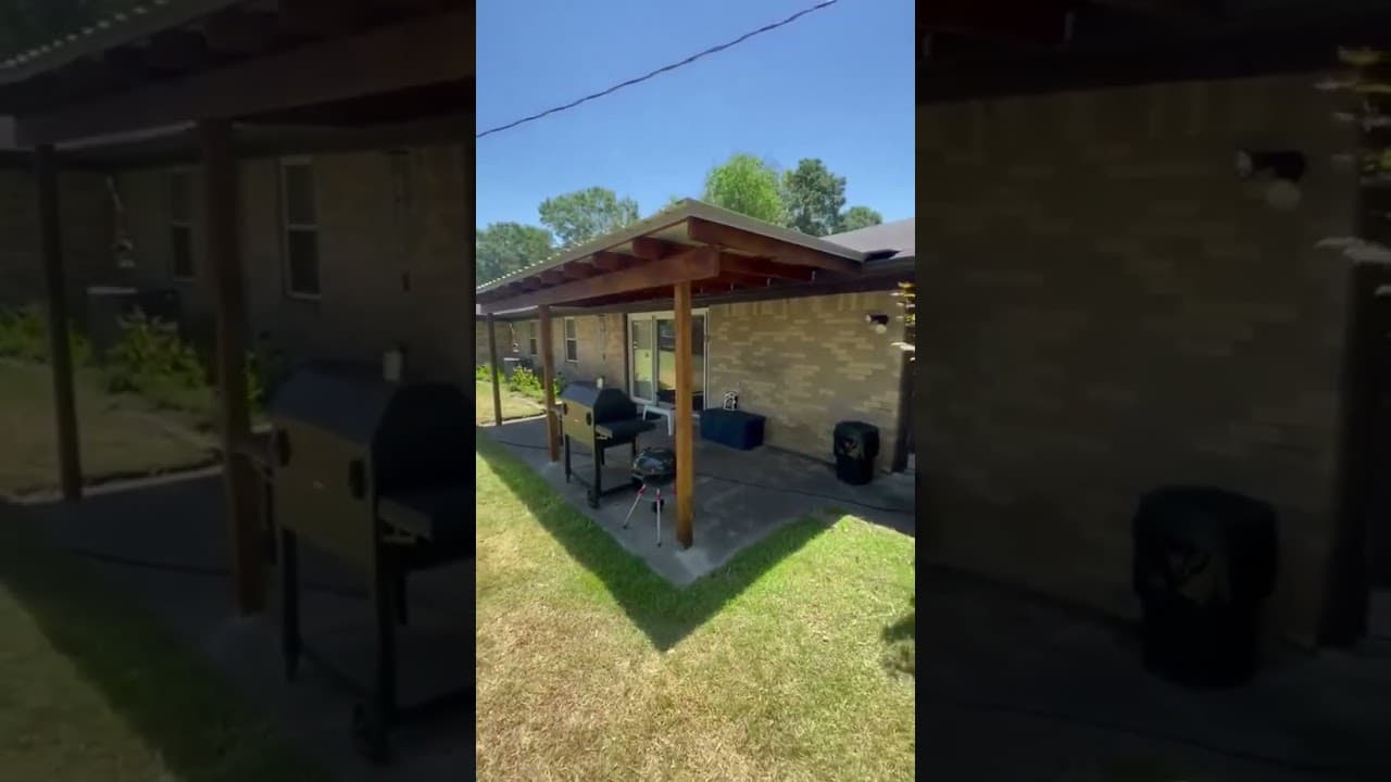 Simple and clean wood frame patio cover with a metal roof stained in a natural cedar color, another