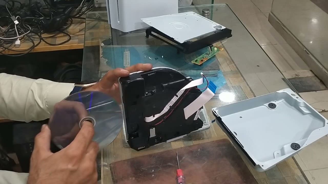 PS5 Slim DVD Rom not feeding disk and making sound repair