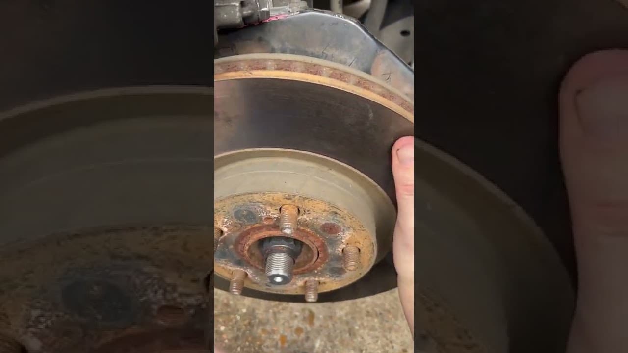 Should my rotor be lose like this with caliper off ? Solved. Lexus es350