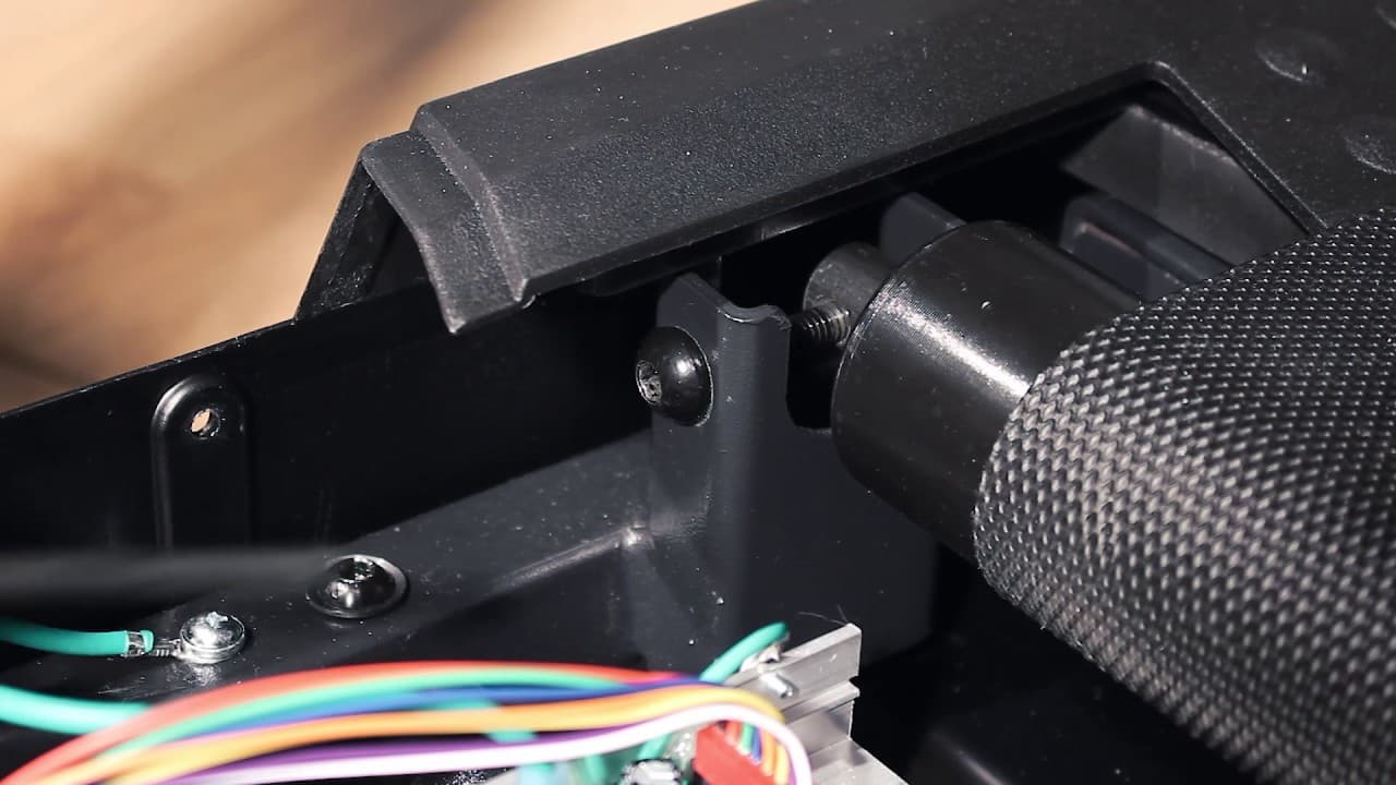 Belt adjustments using the Drive Roller Adjustment Bolt