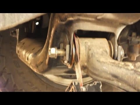 Replace Toyota Lower control arm bushings-SPC Alignment